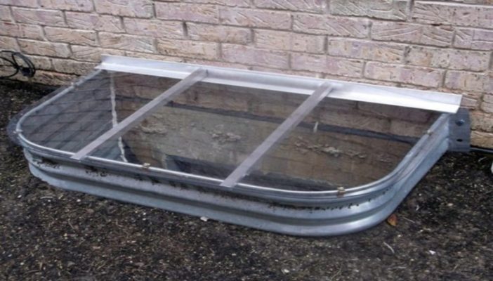 sloped polycarbonate window well cover